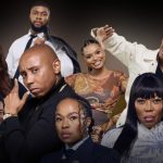Stylish group portrait of eight well-dressed adults