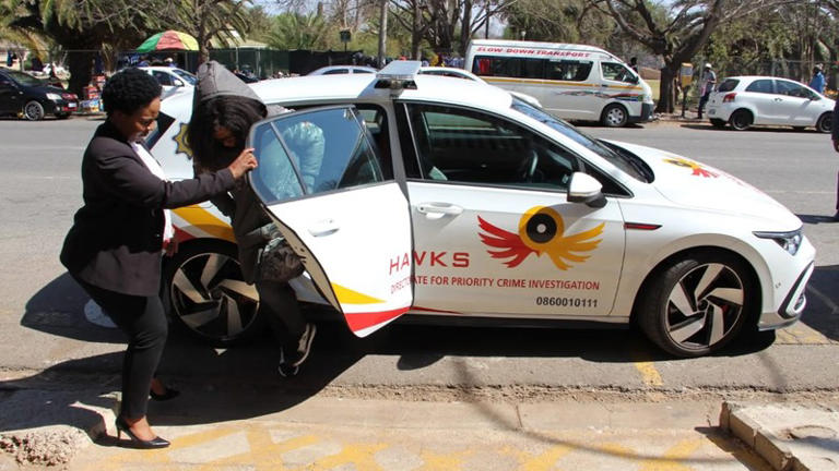 Woman escorted from Hawks investigation vehicle