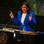 Woman speaking at United Nations podium
